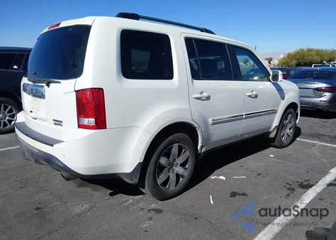 2012 Honda Pilot Touring z USA, uszkodzony, nr VIN 5FNYF4H90CB075668
